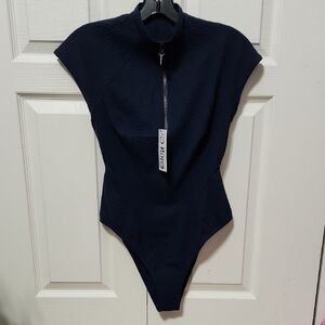 NWT Gigi C One-Piece Surf Suit. Size M